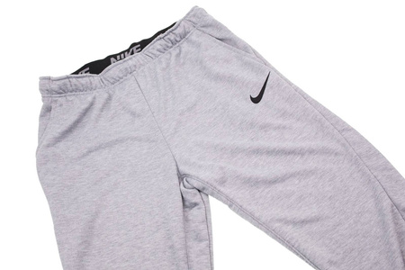 NIKE SPODNIE DRESOWE PANT TRAPER 860371-063